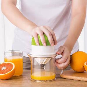 .  Mini lemon and orange juicer with hand-press juicing cup